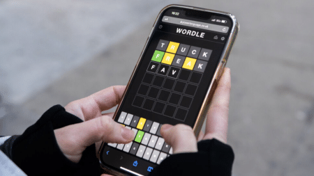 Wordle Hint Today | Answers for August 23, 2025 Image showing a man using Wordle Hint today to solve challenge