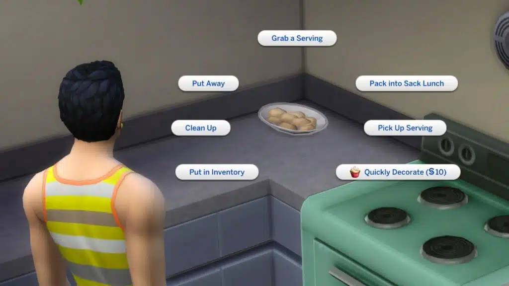 Sim in the kitchen using the new Quickly Decorate pie menu interaction on a plate of Sugar Cookies in The Sims 4 Get to Work